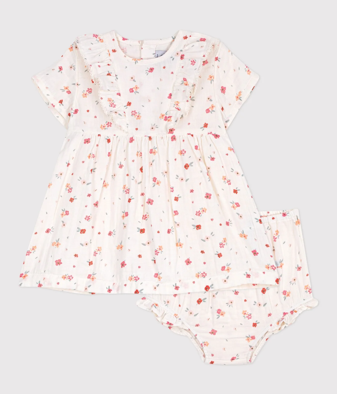Sleeveless baby dress in printed cotton