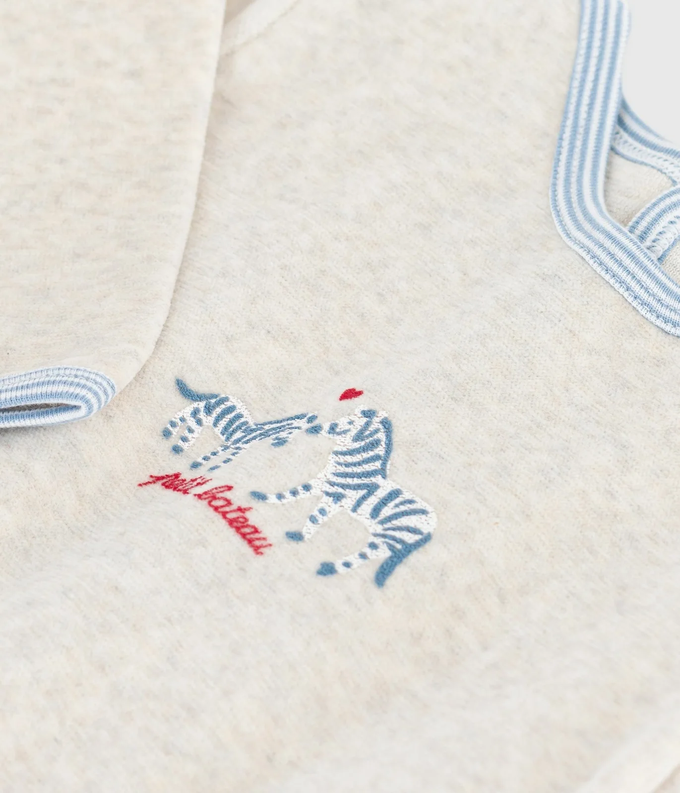 Babies' plain velour pyjama suit with a back opening