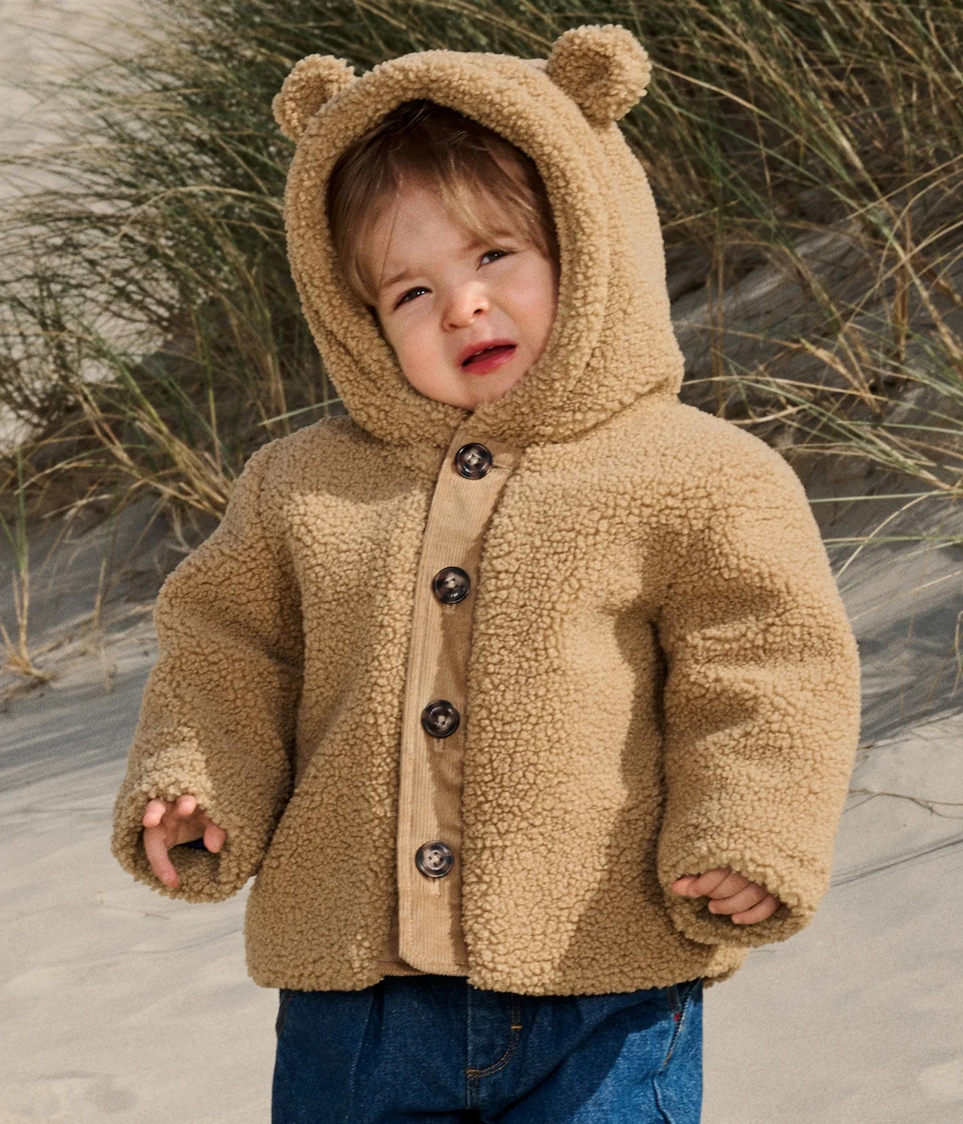 Babies' sherpa coat with a hood