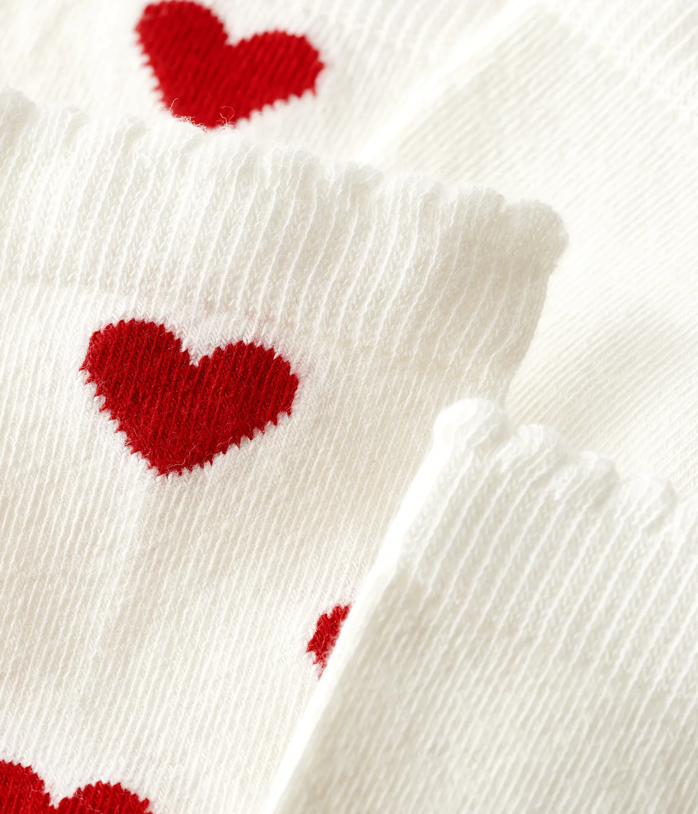2 pairs of children's cotton socks with a heart print