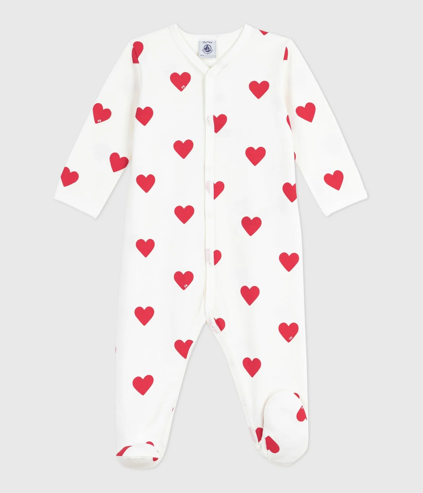 Unisex baby sleepsuit in heart-print cotton