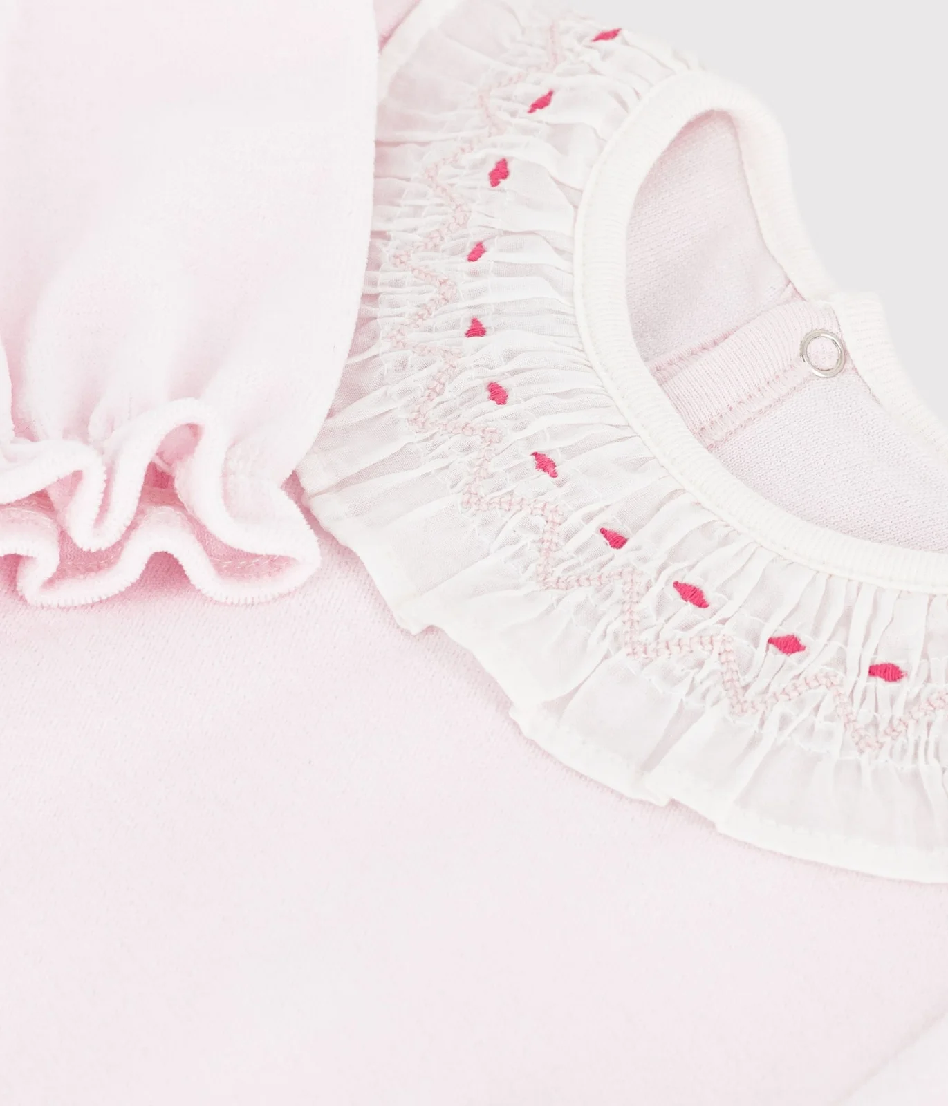 Babies' plain velour pyjama suit with a ruff and a back opening