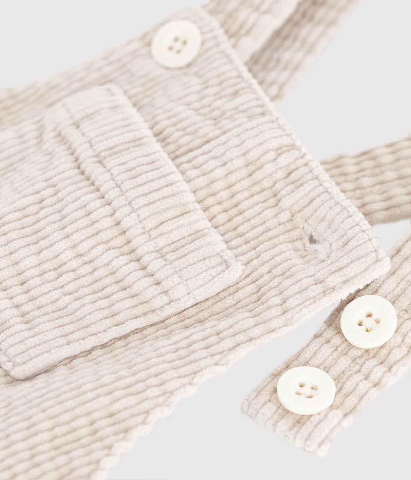 Babies' long-leg dungarees in plain corduroy