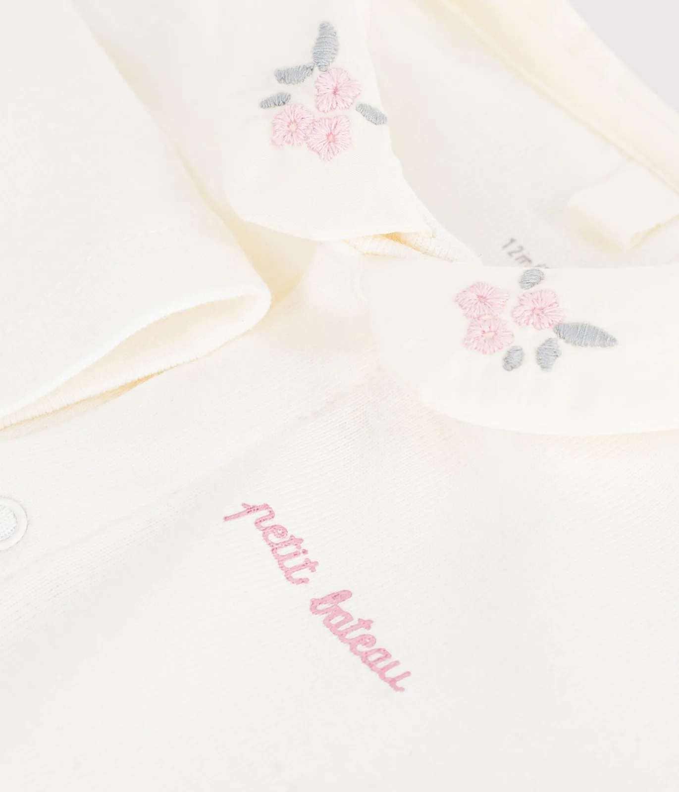Babies' long-sleeved plain cotton body with an embroidered collar