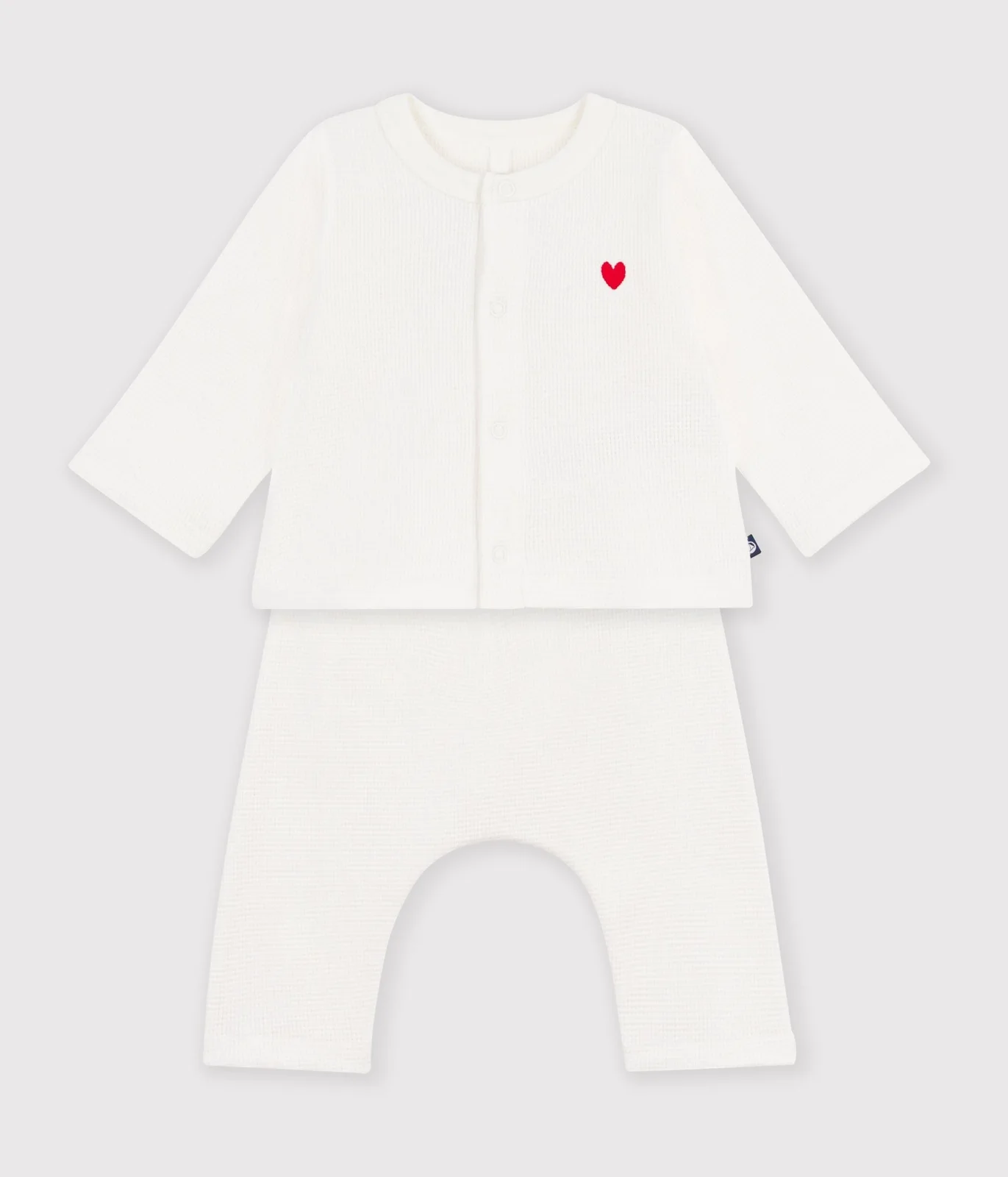 Baby set in plain embroidered cotton chest