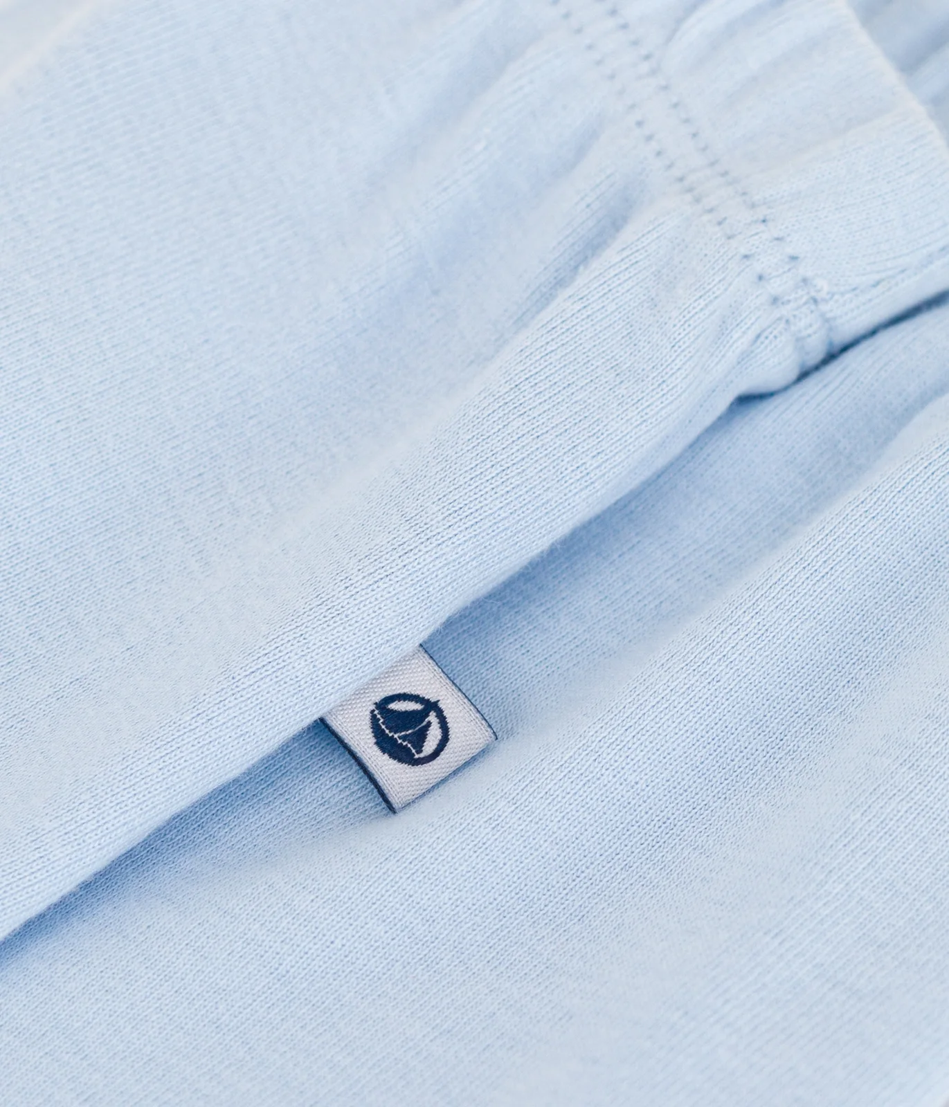 Newborn babies' plain cotton trousers with feet