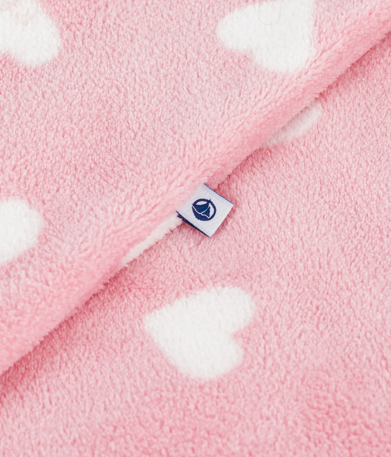 Babies' onesie in heart-print fleece