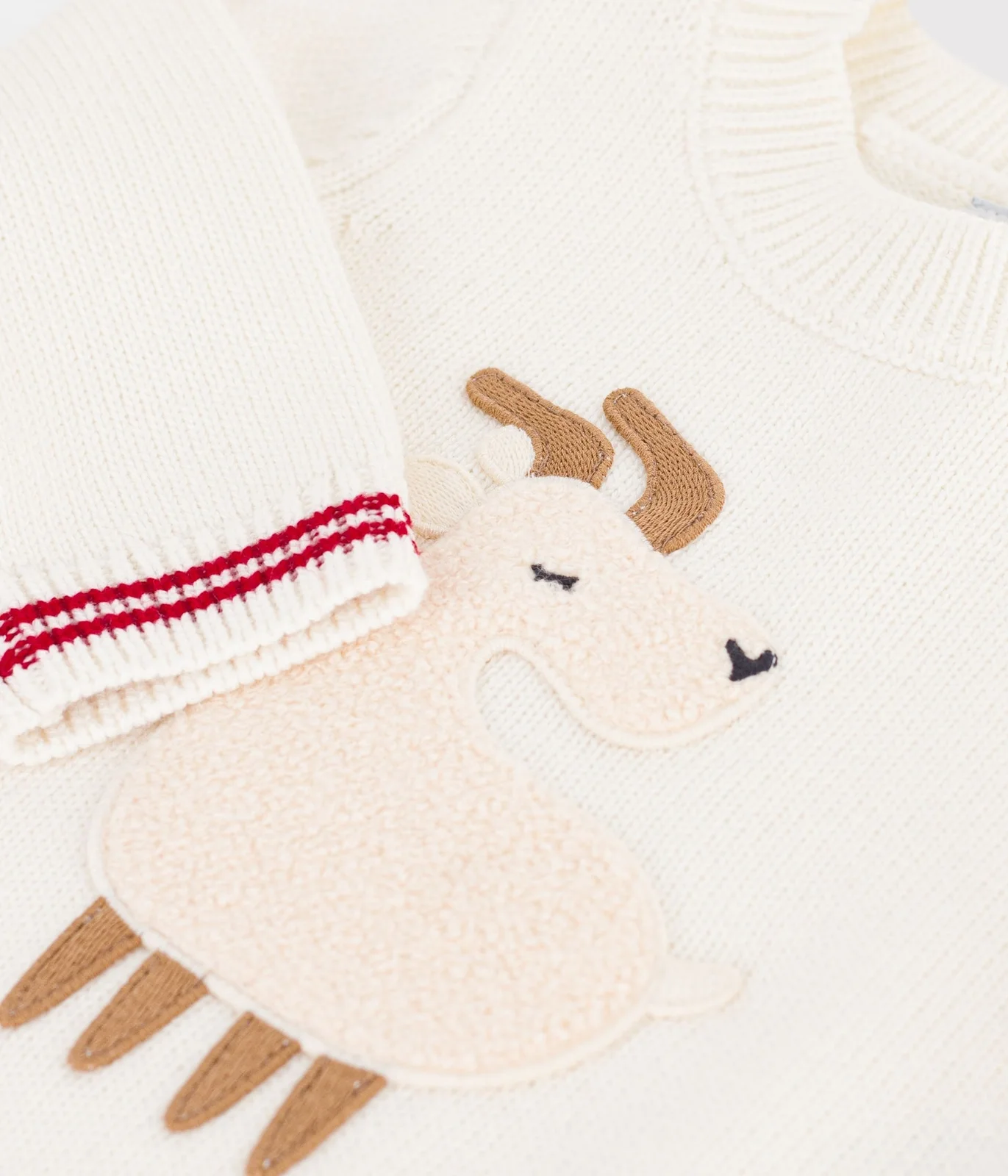 Babies' jumper in a wool and cotton knit with an animal design