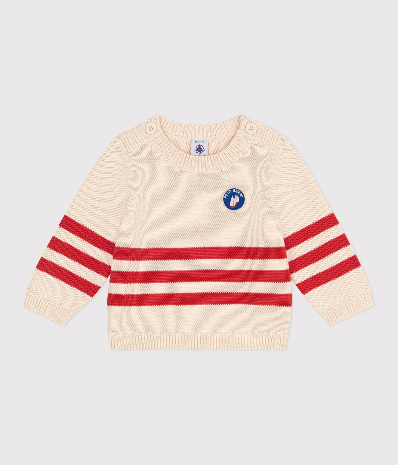 Babies' cotton jumper with placed stripes and a badge on the chest