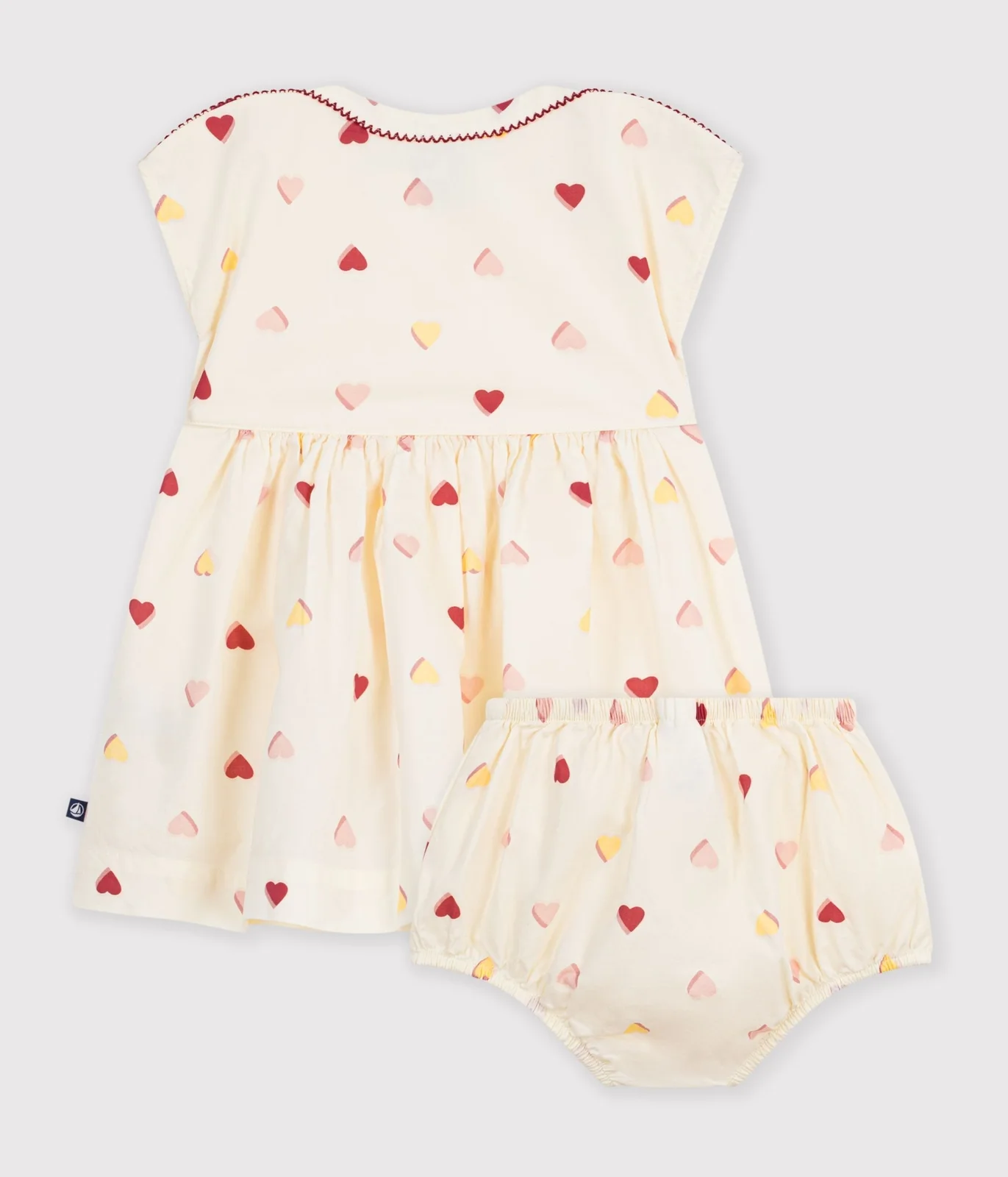 Babies' short-sleeved cotton dress printed with hearts.