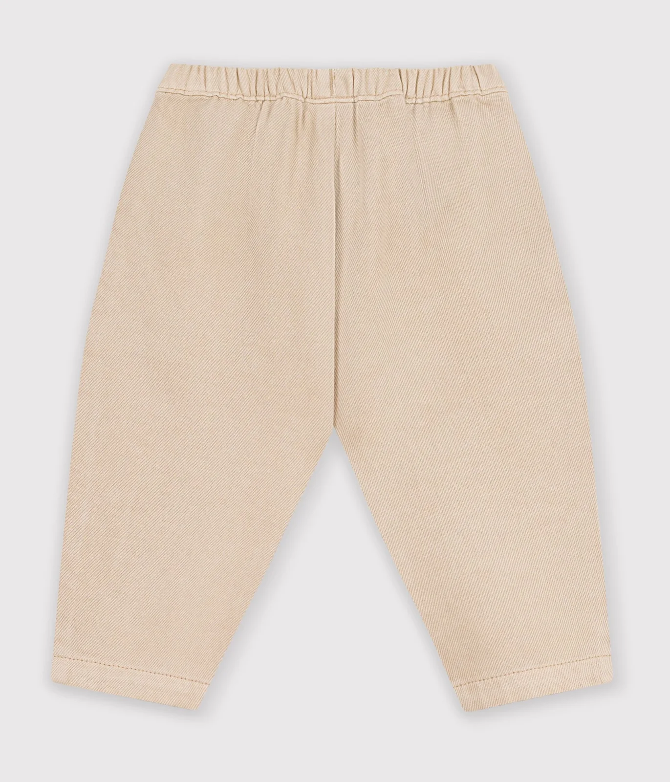 Babies' cargo-style trousers in plain cotton with a badge