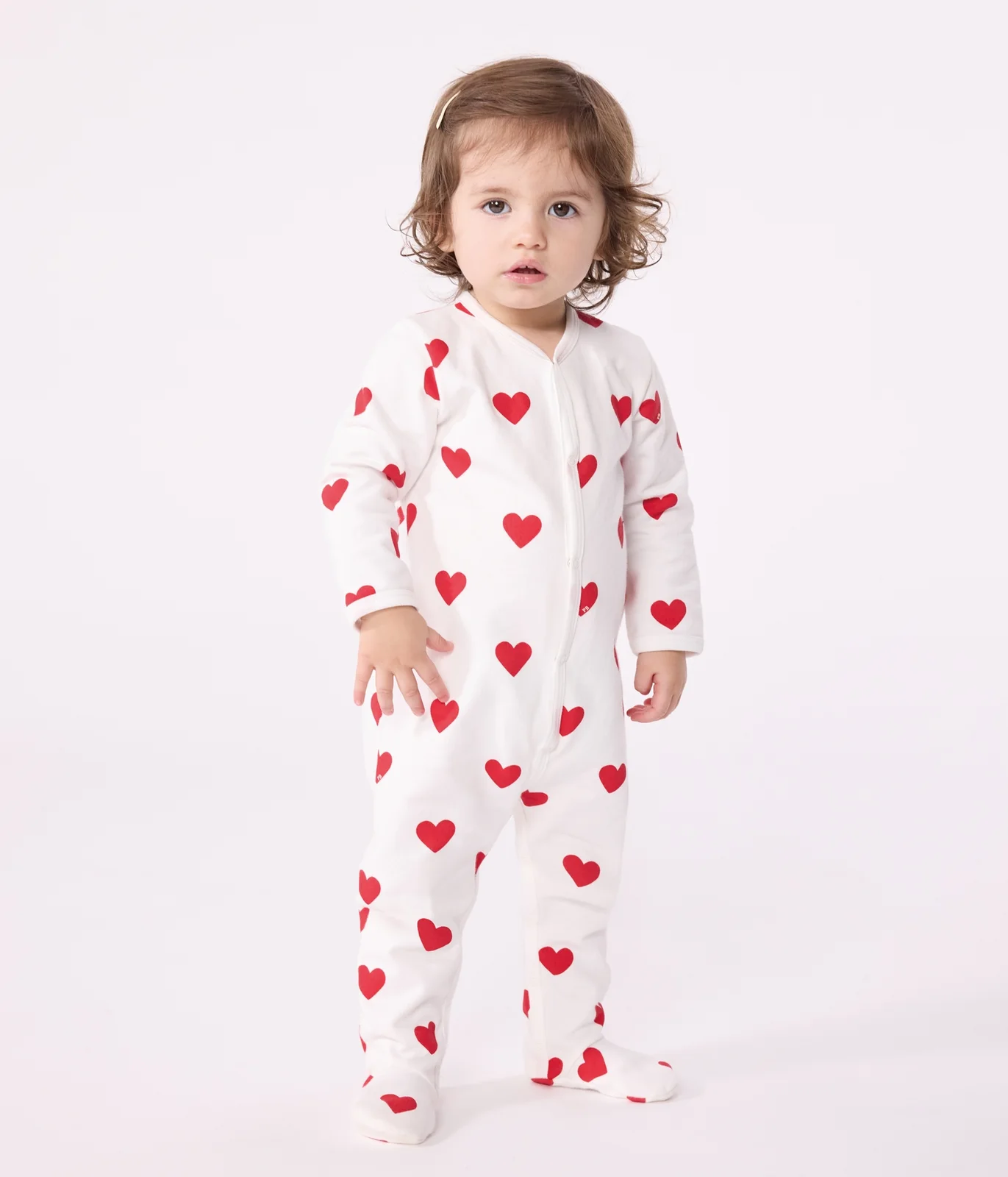 Baby fleece pyjamas with red hearts