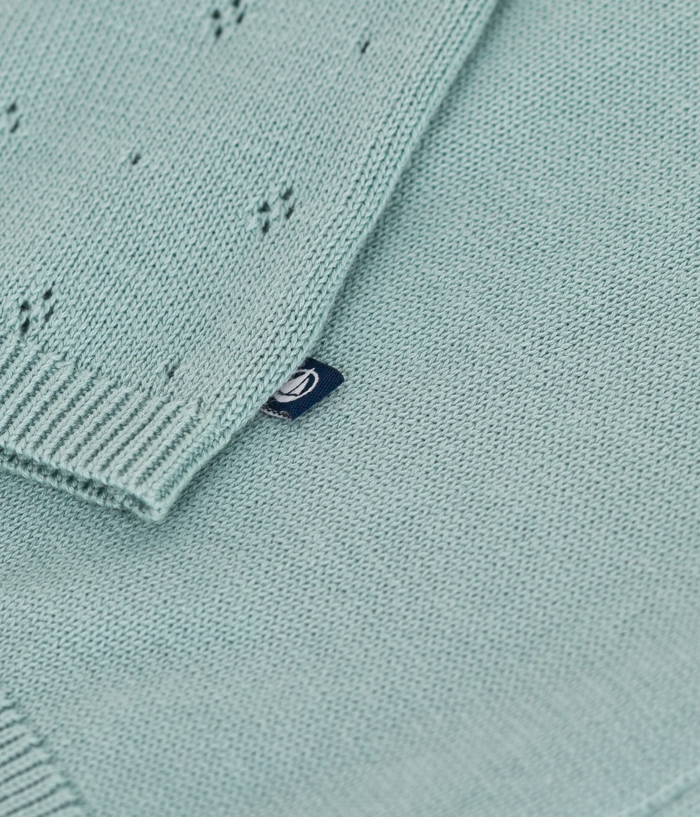 Babies' cotton cardigan in a decorative stitch