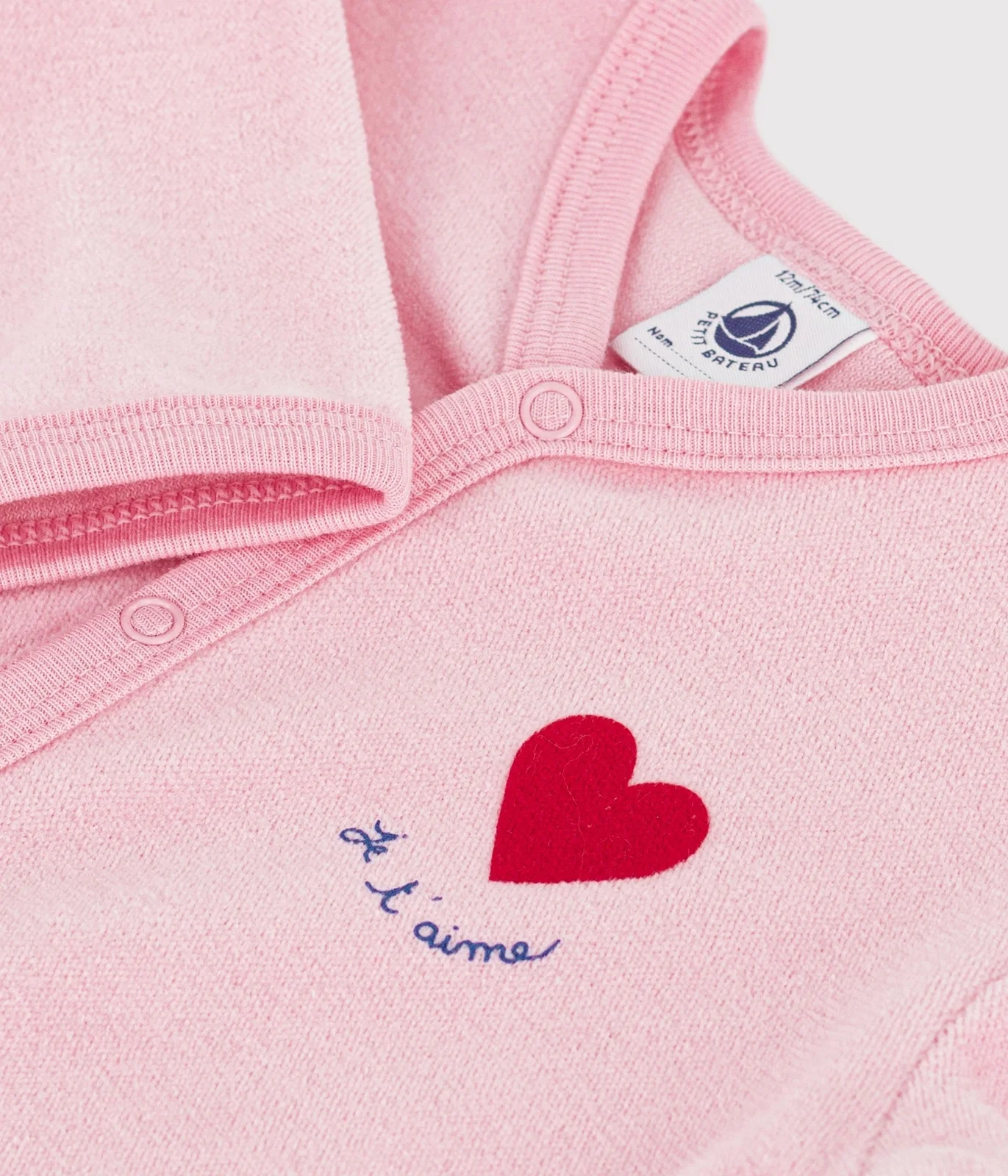 Babies' plain velour pyjama suit with a placed design