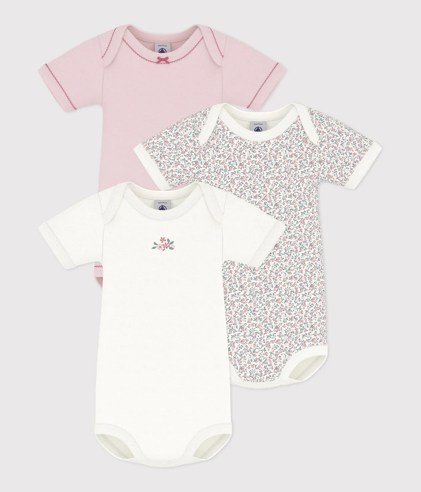 Pack of short-sleeved flower print cotton bodies for babies