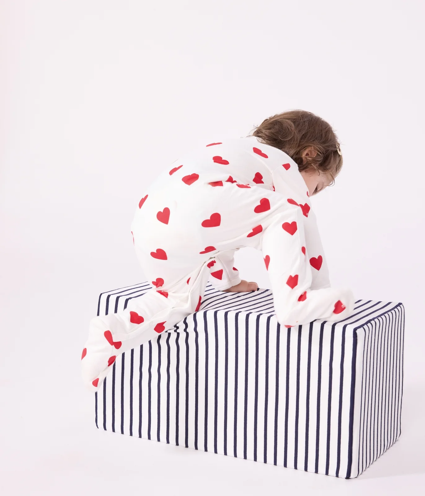 Baby fleece pyjamas with red hearts