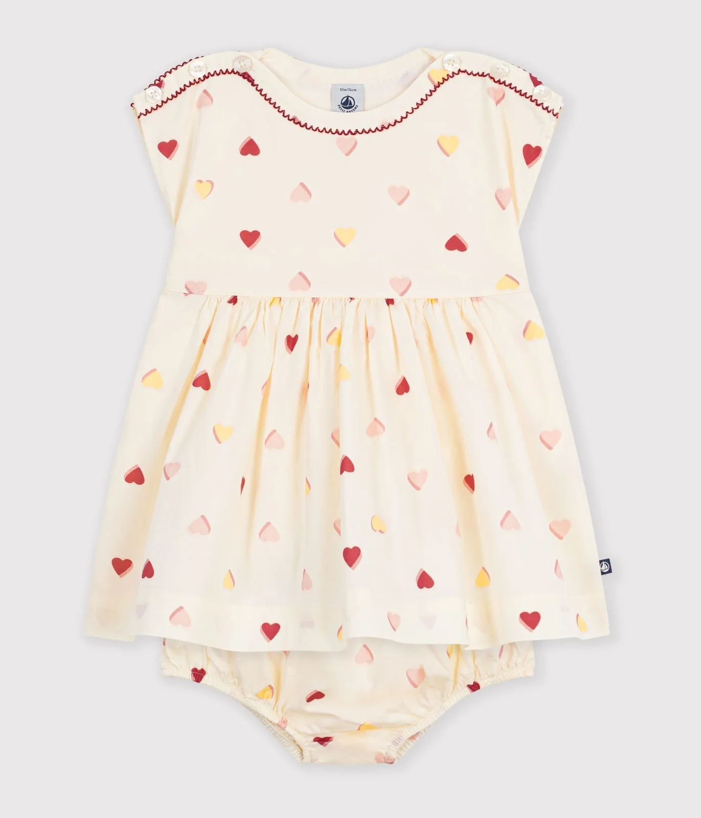 Babies' short-sleeved cotton dress printed with hearts.