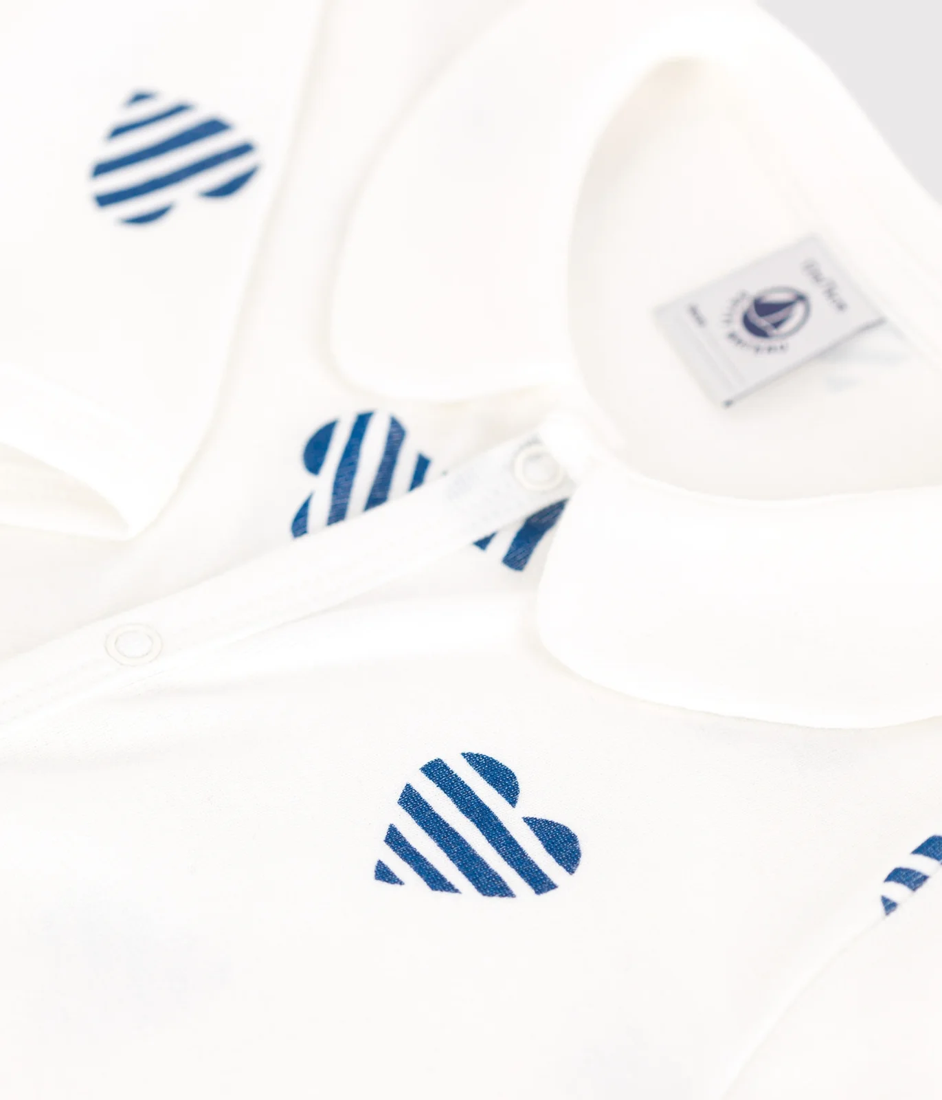 Babies' stripy footless cotton pyjamas with a heart-patterned collar