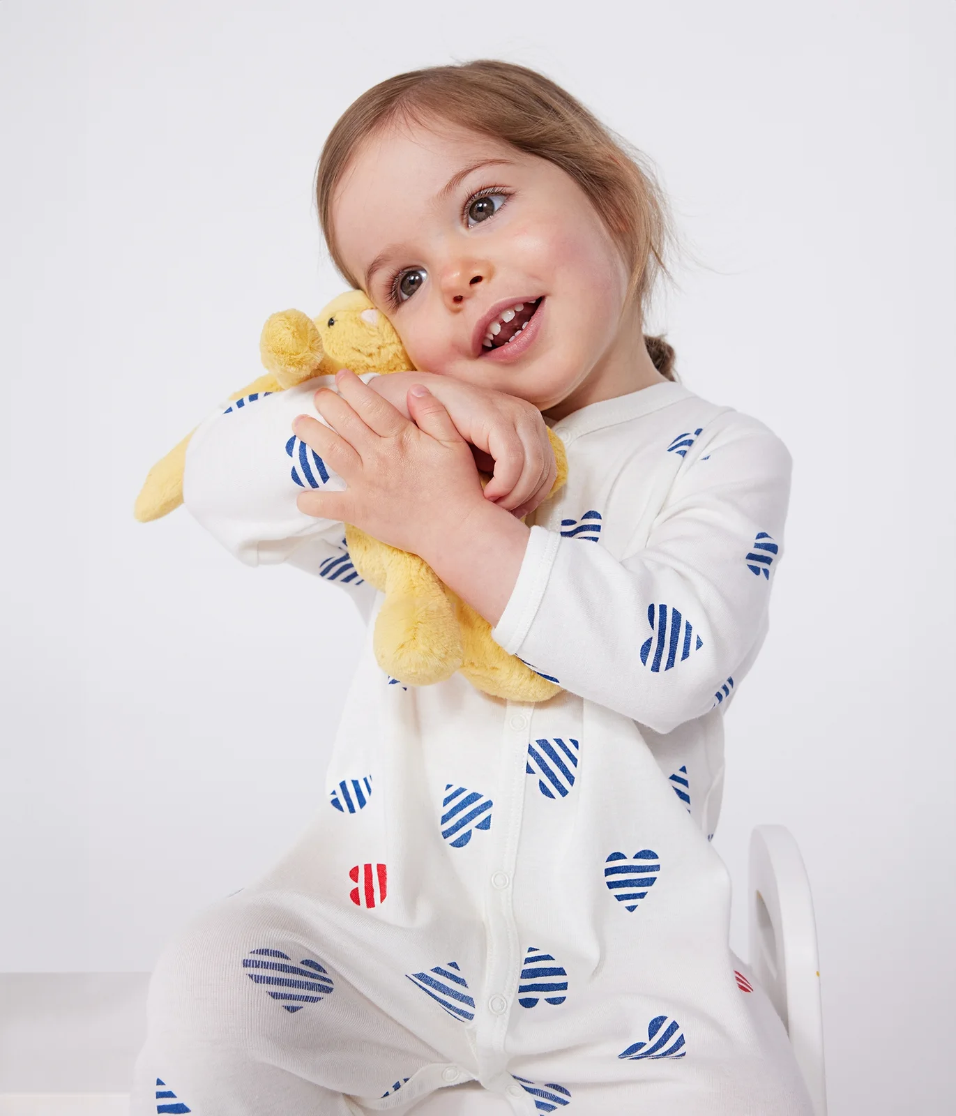 Babies' stripy heart-patterned cotton pyjamas